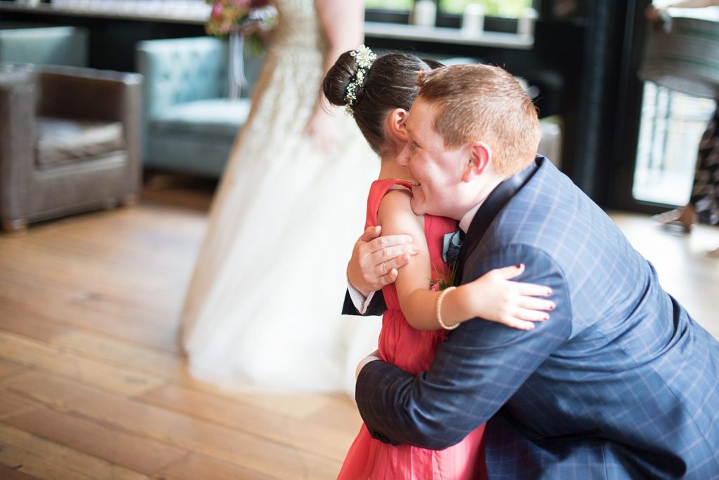 A 501 Union wedding with photos by Mikkel Paige Photography of the bride and her flower girl.
