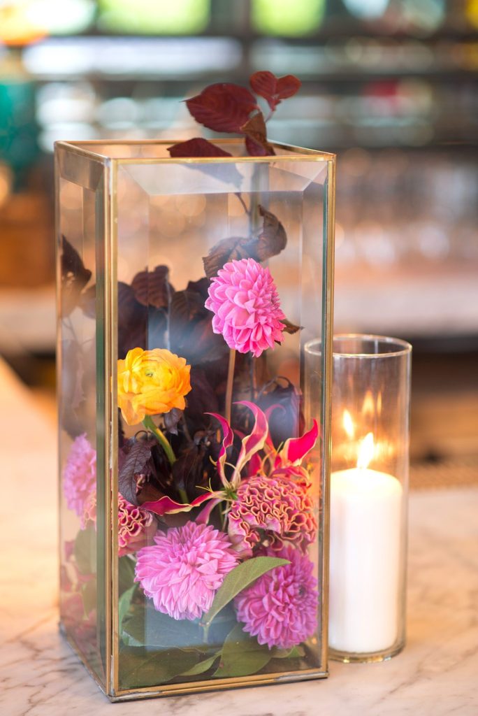 A 501 Union wedding with photos by Mikkel Paige Photography. Colorful cocktail hour flowers by August Sage and Violet. Planning by Ashley Chamblin Events.