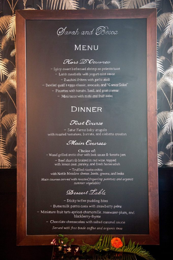 A 501 Union wedding with photos by Mikkel Paige Photography. The reception menu was written on a large chalkboard with catering by Ryan Brown and planning by Ashley Chamblin Events.