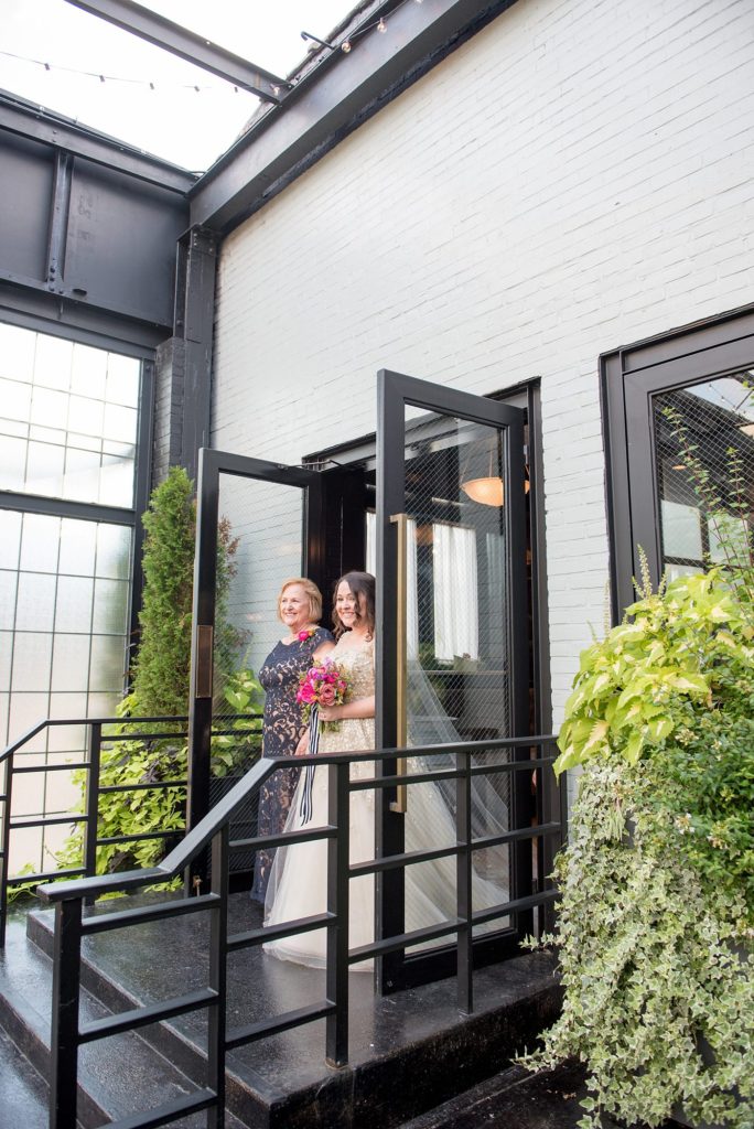 A 501 Union wedding with photos by Mikkel Paige Photography of the ceremony. The bride and her mother walked down the aisle in this Brooklyn, NY venue.