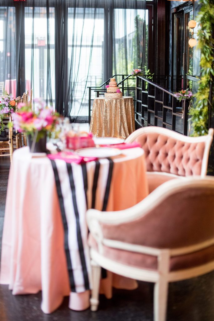 501 Union wedding with photos by Mikkel Paige Photography. The reception in Brooklyn, NY was lined with rectangular tables covered in pink linens, with vibrant flowers by August Sage and Violet and planning by Ashley Chamblin Events.