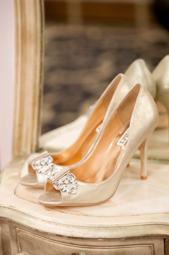 The bride's gold shoes for a Crystal Plaza Wedding in New Jersey with photos by Mikkel Paige Photography.