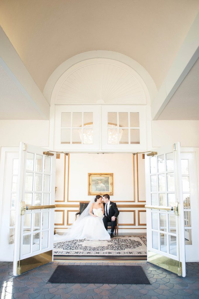 The bride and groom take photos with Mikkel Paige Photography at their luxury Crystal Plaza Wedding in New Jersey.