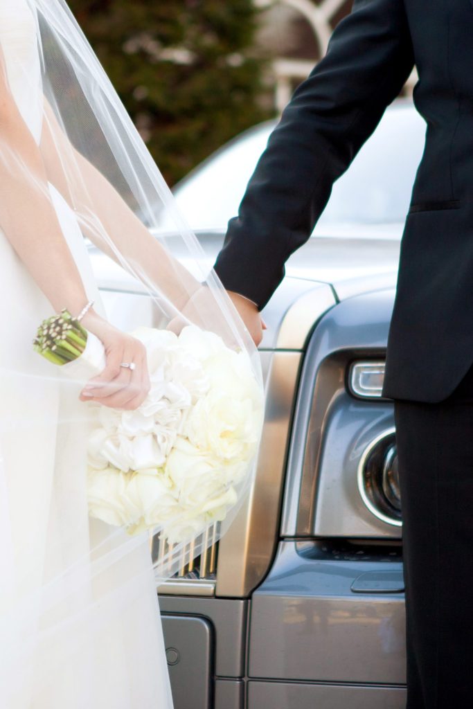 The bride and groom take photos with Mikkel Paige Photography at their luxury Crystal Plaza Wedding in New Jersey.