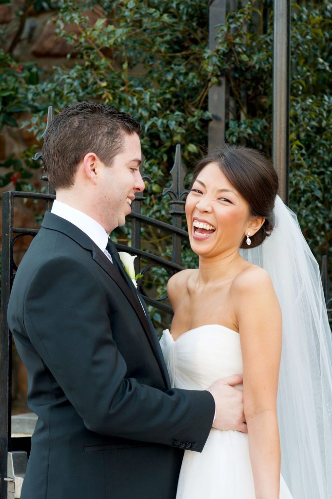 The bride and groom take photos with Mikkel Paige Photography at their luxury Crystal Plaza Wedding in New Jersey.