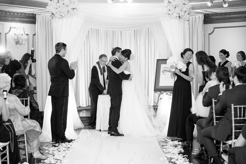 Pictures of an indoor ceremony for a luxurious January wedding at the Crystal Plaza in NJ. Photos by Mikkel Paige Photography.
