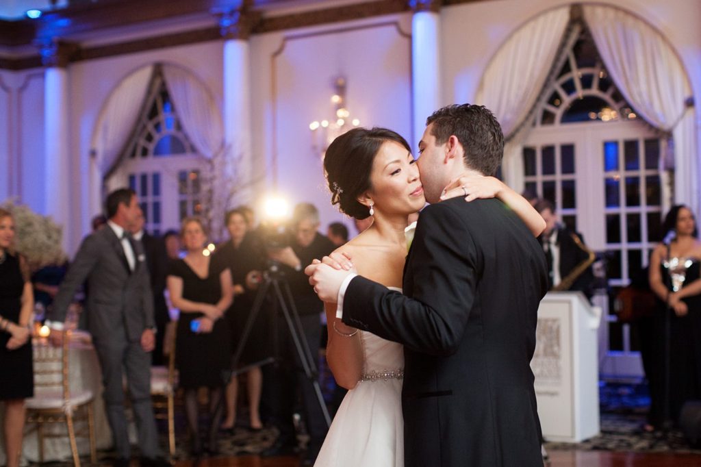 The bride and groom shared their first dance at their Crystal Plaza wedding in NJ, photographed by Mikkel Paige Photography.