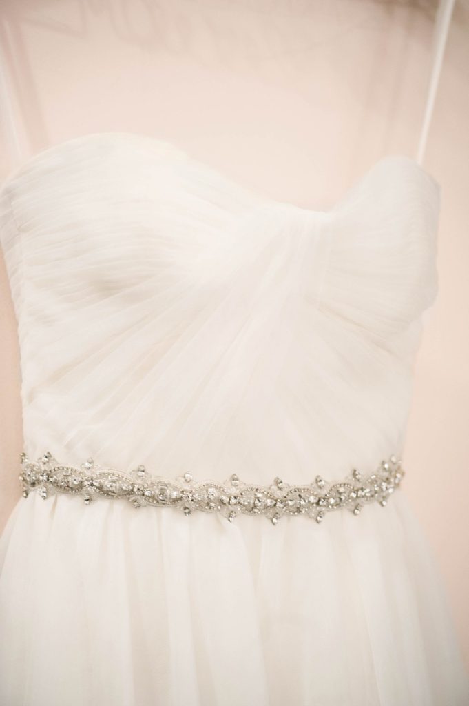 The bride's tulle gown for her winter wedding at Crystal Plaza in New Jersey with photos by Mikkel Paige Photography.