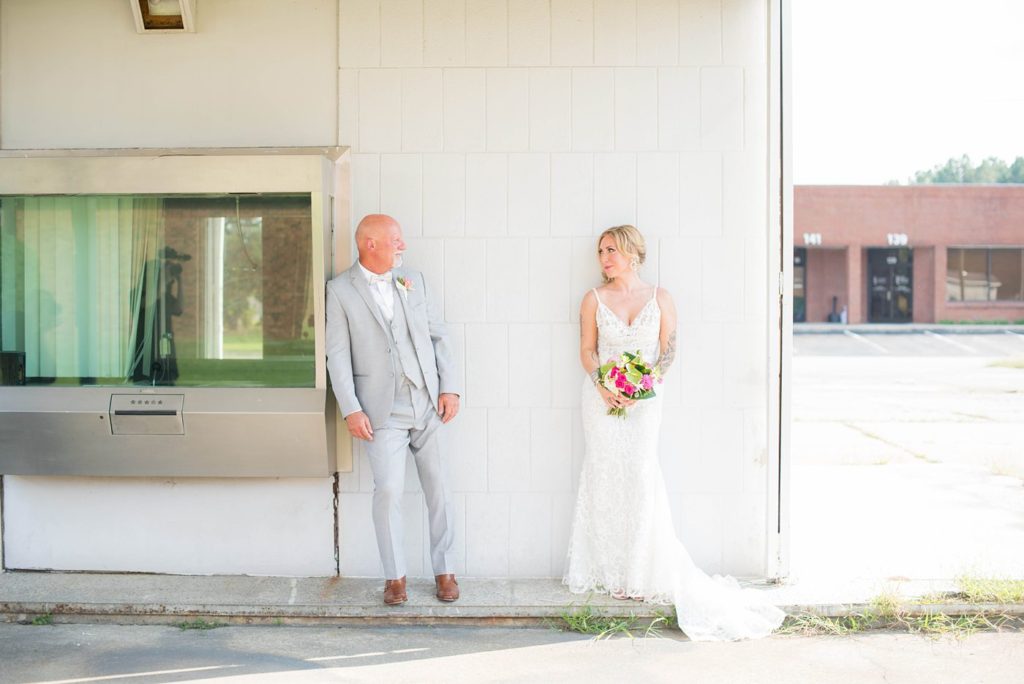Fuquay-Varina wedding at Highgrove Estate in North Carolina with photos by Mikkel Paige Photography. The bride carried a tropical bouquet by Flowers on Broad Street.