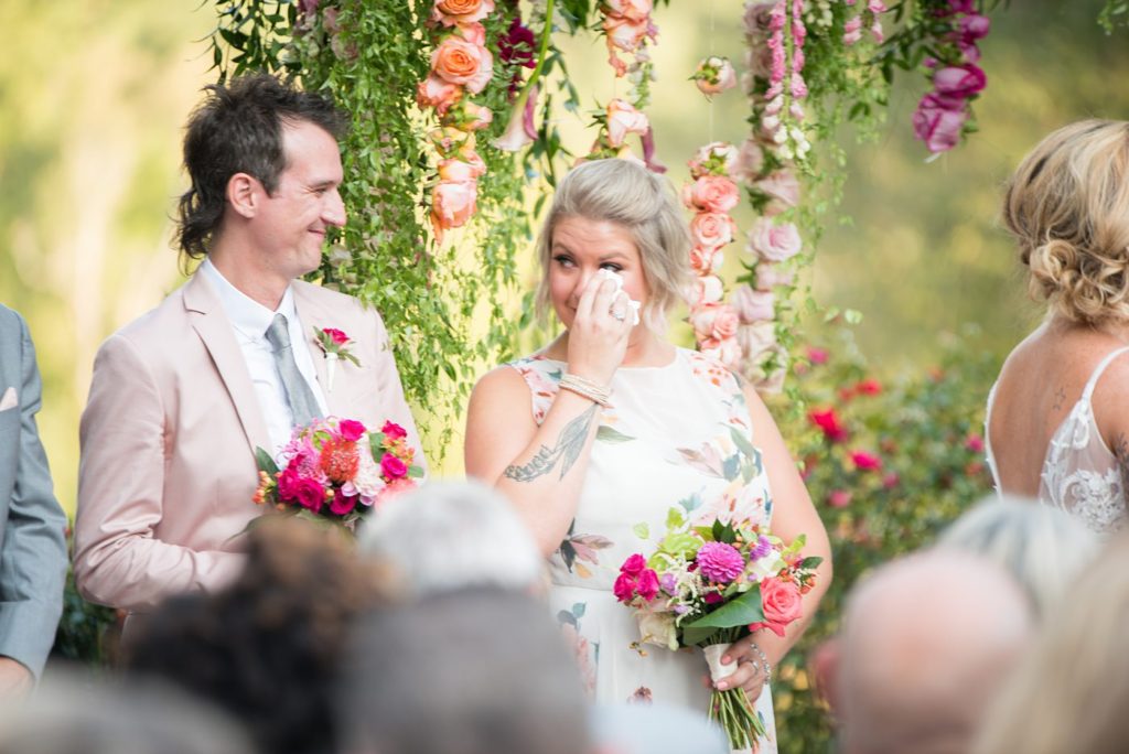 Fuquay-Varina wedding at Highgrove Estate in North Carolina with photos by Mikkel Paige Photography. The outdoor ceremony was covered in petals and flowers by Flowers on Broad Street.
