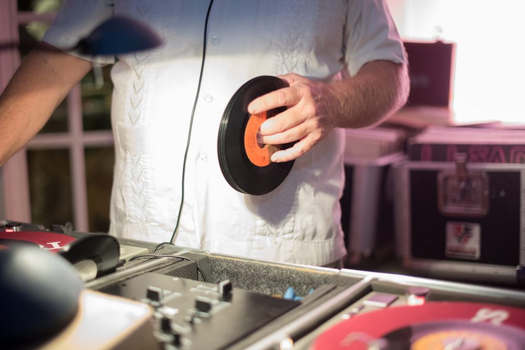 Fuquay-Varina wedding at Highgrove Estate in North Carolina with photos by Mikkel Paige Photography. A DJ played music from real records for the reception.