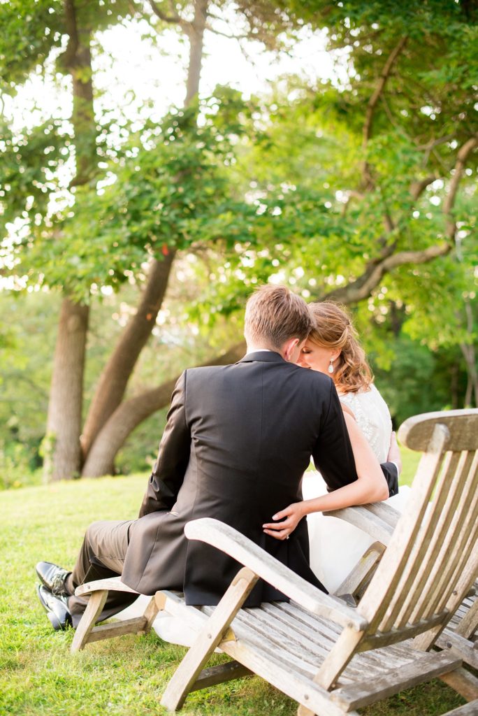 Bride and groom share a moment during golden hour captured by Mikkel Paige Photography at Southwood Estate overlooking the Hudson River in the valley, in upstate New York.