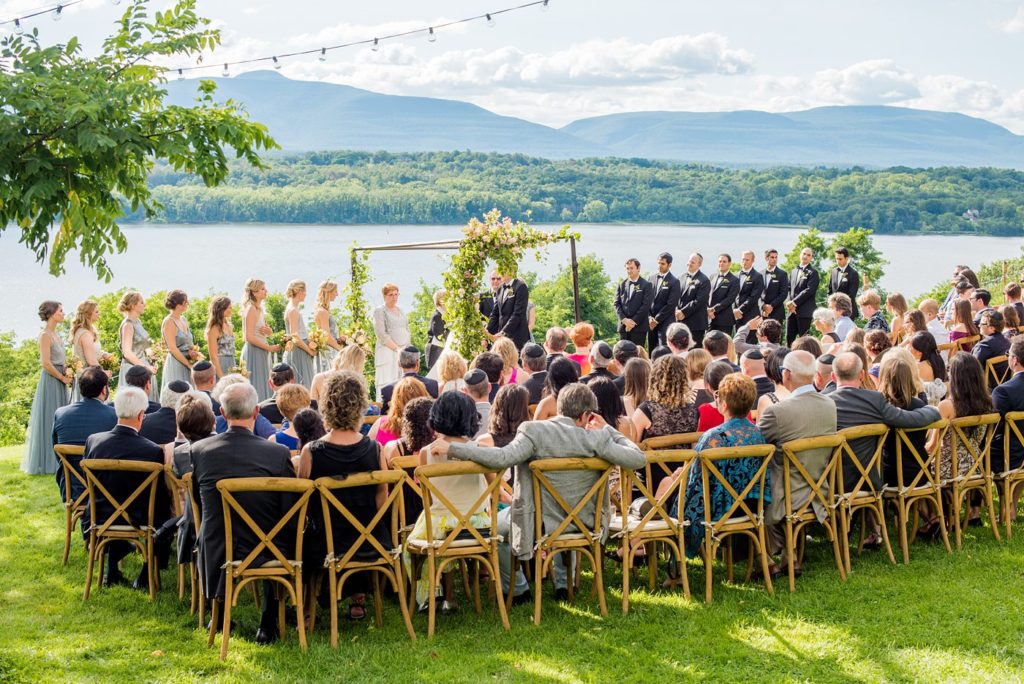 A wedding in upstate New York had a prime view of the Hudson River at Southwood Estate. Photos taken by Mikkel Paige Photography, destination and luxury photographer. Planning by The Union Studio.