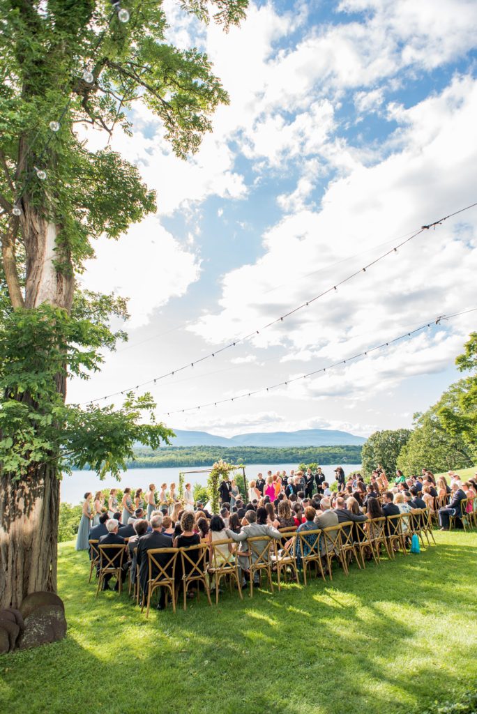 A wedding in upstate New York had a prime view of the Hudson River at Southwood Estate. Photos taken by Mikkel Paige Photography, destination and luxury photographer. Planning by The Union Studio.