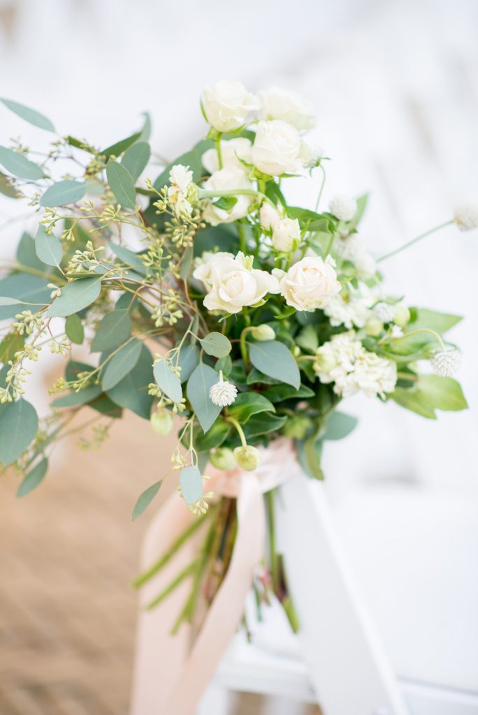 Mikkel Paige Photography captures a Prospect Park Boathouse wedding in Brooklyn, New York. The bride and groom had an outdoor ceremony with aisle flowers by Sachi Rose Designs.