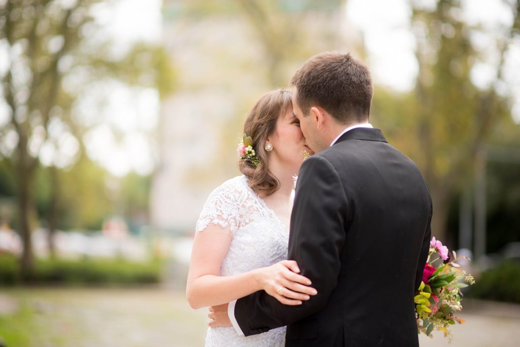 Mikkel Paige Photography photos of the bride and groom's first look at Grand Army Plaza for their Prospect Park Boathouse wedding in Brooklyn, New York. Bouquet created by Sachi Rose Designs.