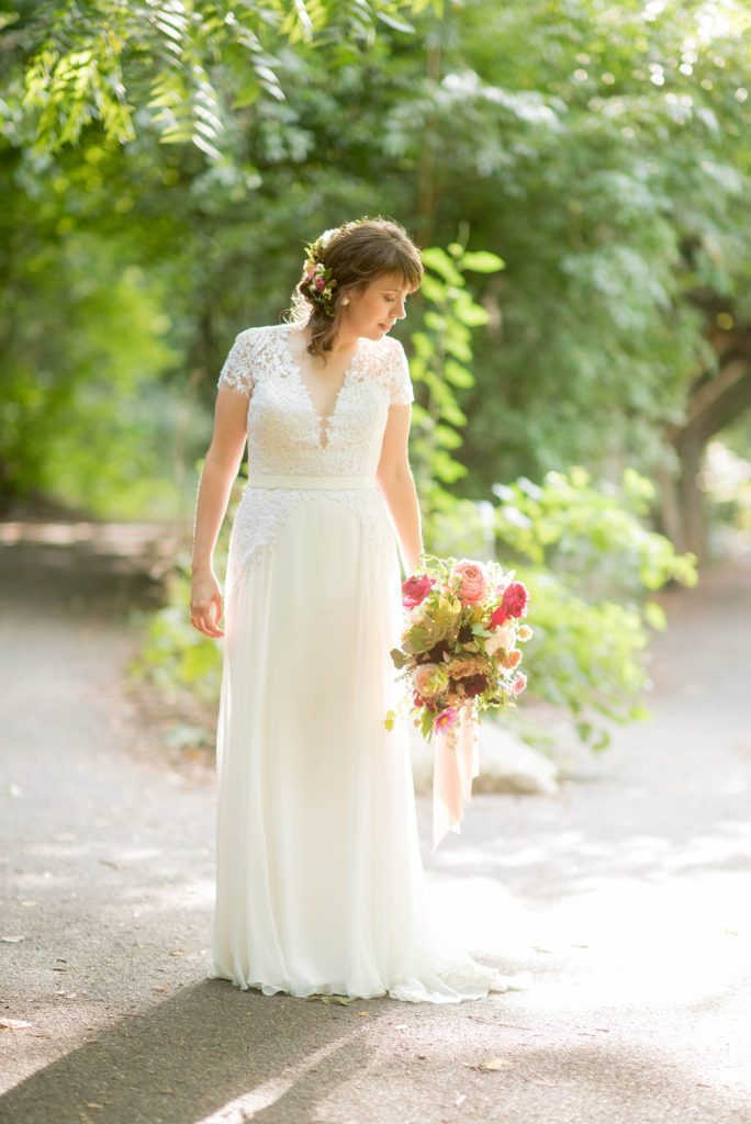 Mikkel Paige Photography photo of the bride at a Prospect Park Boathouse wedding in Brooklyn, New York. Bouquet created by Sachi Rose Designs.