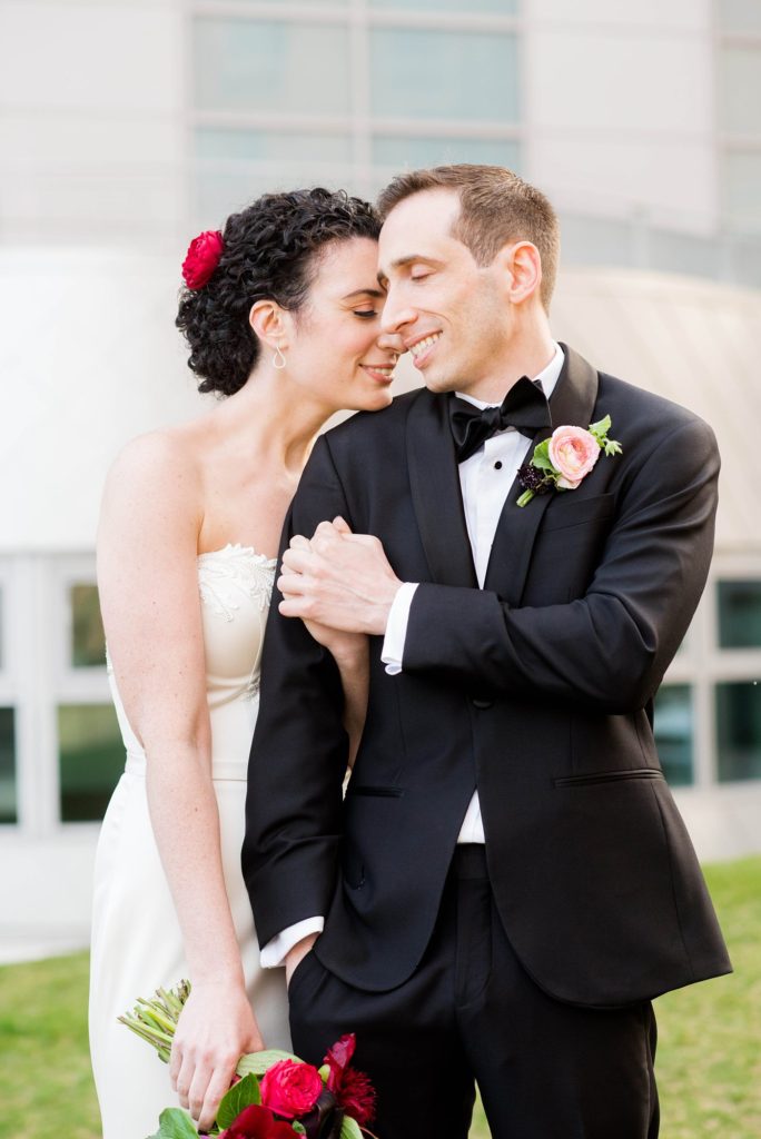 Photos of the bride and groom at their W Hoboken wedding, a New Jersey event venue. Captured by Mikkel Paige Photography.