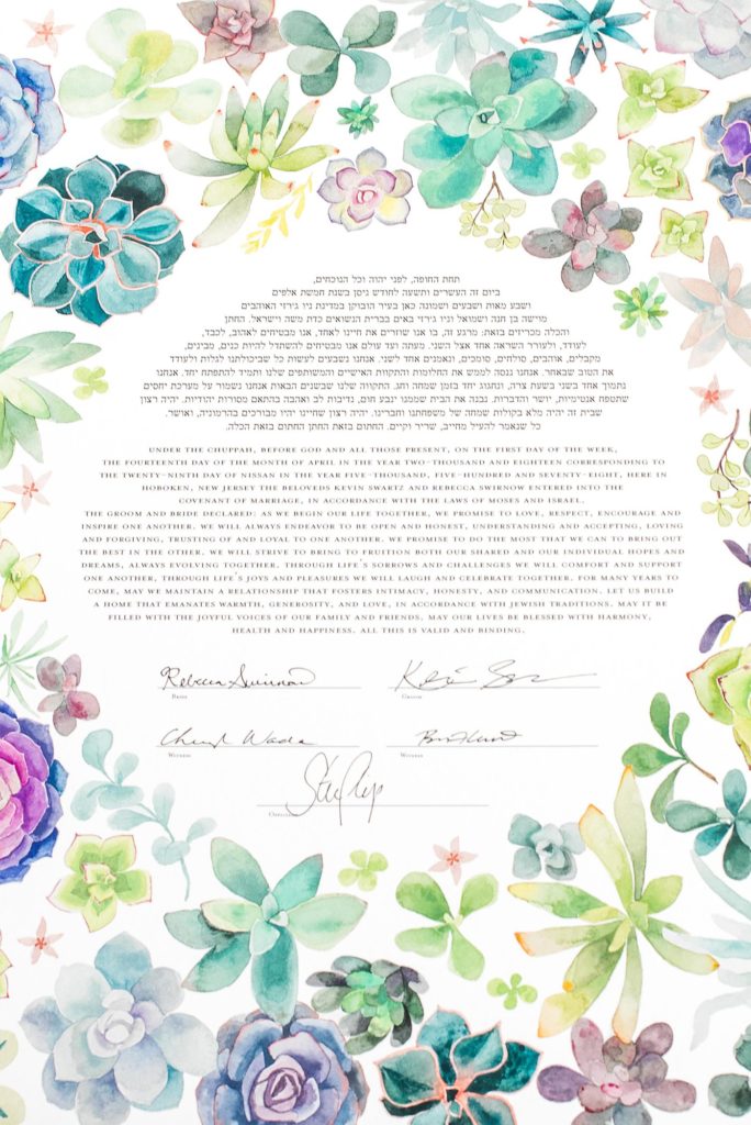 Photos of the bride and groom's Jewish ceremony ketubah at their W Hoboken Wedding by Mikkel Paige Photography. Floral design by Sachi Rose.