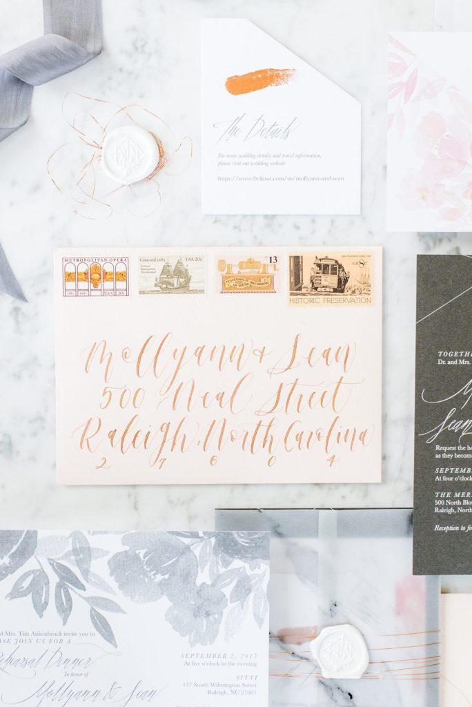 Detail image of the envelope hand calligraphed at a luxury wedding in Raleigh, North Carolina. Photos by Mikkel Paige Photography. Stationery by One and Only Paper and planning by C&D Events.
