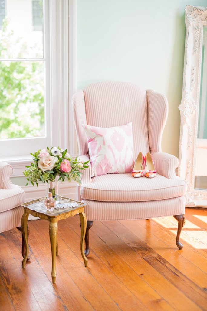 A photo of the bride's details, including Kate Spade shoes, for her day by Mikkel Paige Photography at a wedding venue in Raleigh, North Carolina, Merrimon-Wynne House.