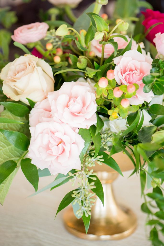 Photos of a floral arrangement by Mikkel Paige Photography. Created by Eclectic Sage for a wedding venue in Raleigh NC, Merrimon-Wynne.