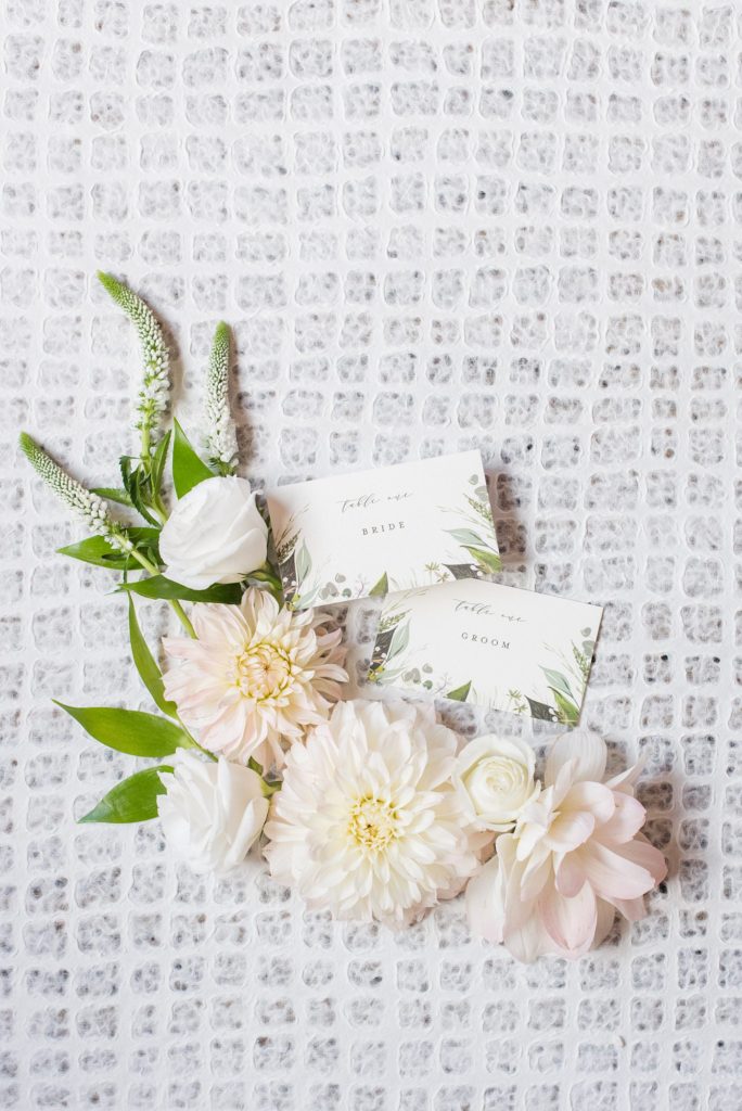 Flat lay styling for luxury and destination weddings and events by Mikkel Paige Photography. This stationery was for a wedding at Crabtree's Kittle House in Chappaqua, New York.