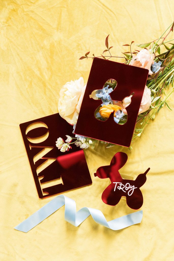 Flat lay styling for destination weddings and events by Mikkel Paige Photography. This stationery suite was for a city luxury wedding by planner Color Pop Events, at the Green Building in Brooklyn, New York.