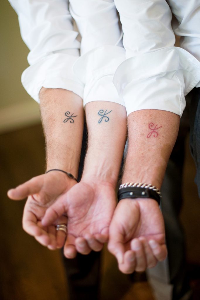 Hamptons wedding photographer captures two grooms for a same sex wedding at a private home. Images by Mikkel Paige Photography.