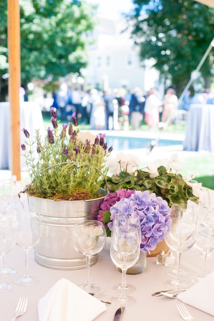 Hamptons wedding photographer captures two grooms for a same sex wedding at a private home with a tented outdoor reception. Images by Mikkel Paige Photography.