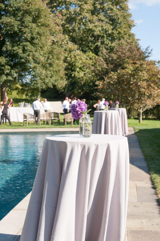 Hamptons wedding photographer captures two grooms for a same sex wedding at a private home with a tented outdoor reception. Images by Mikkel Paige Photography.