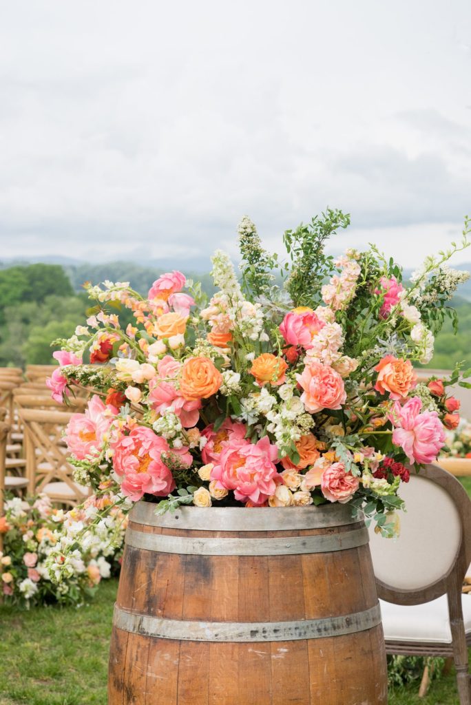 Mount Ida Farm wedding photos by Mikkel Paige Photography with an outdoor ceremony overlooking the Blue Ridge Mountains. Flowers by Meristem Floral and planning by Viva L'Event.