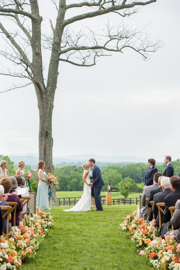 Mount Ida Farm wedding photos by Mikkel Paige Photography with an outdoor ceremony overlooking the Blue Ridge Mountains. Planning by Viva L'Event and flowers by Meristem Floral.