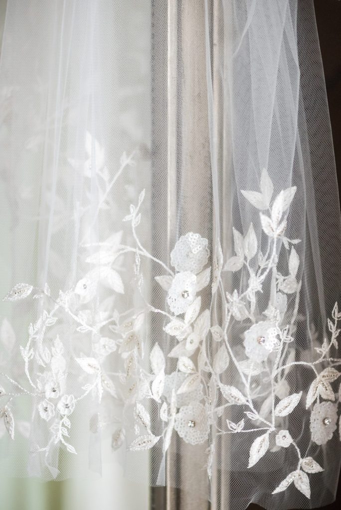 Mount Ida Farm wedding photos by Mikkel Paige Photography in Charlottesville, Virginia. Planning by Viva L'Event. Image of the veil detail for the bride.