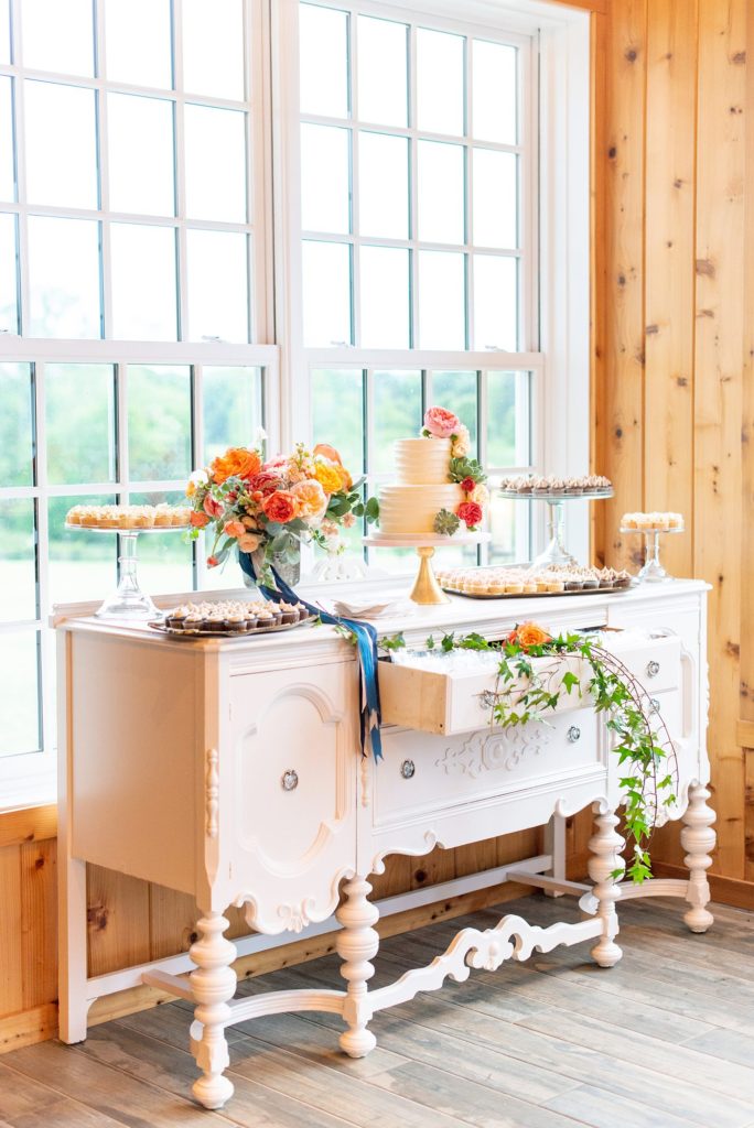 Mount Ida Farm wedding photos by Mikkel Paige Photography with an indoor luxury reception and dessert bar in the Blue Ridge Mountains. Flowers by Meristem Floral and planning by Viva L'Event.