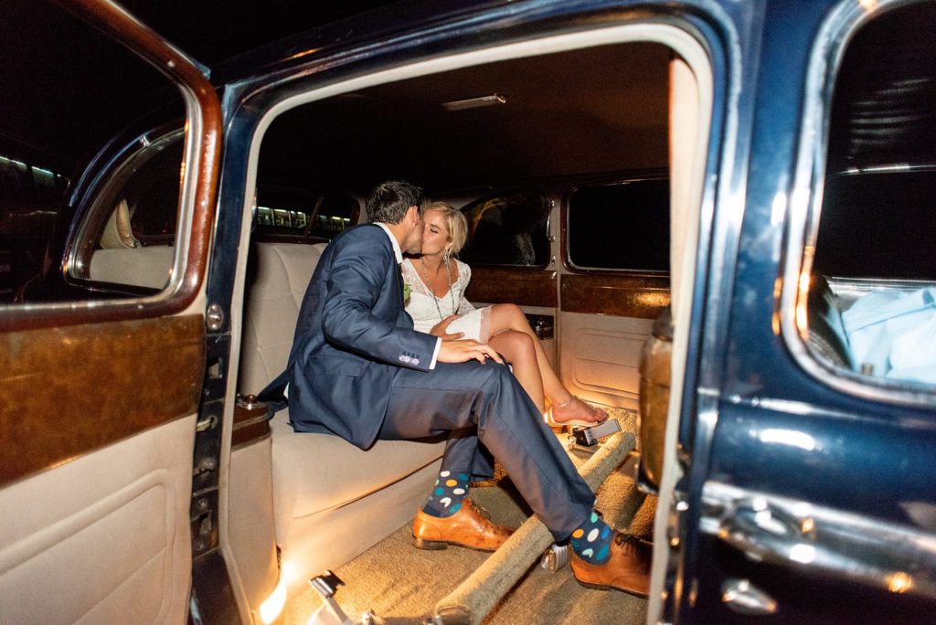 Mount Ida Farm wedding photos by Mikkel Paige Photography with a luxury reception and vintage getaway exit car in the Blue Ridge Mountains. Planning by Viva L'Event.