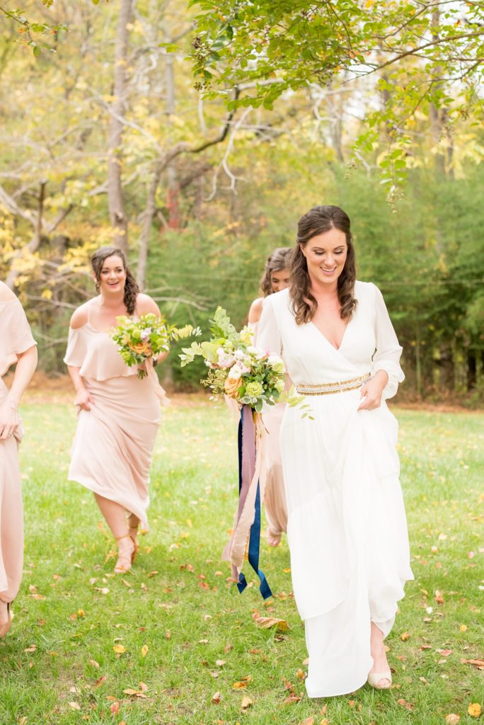 Small wedding in North Carolina with photos by Mikkel Paige Photography. The bride and groom got married in an intimate setting at historic Leslie-Alford Mims House in Cary. The bride carried a fall bouquet with jewel tone silk ribbons.