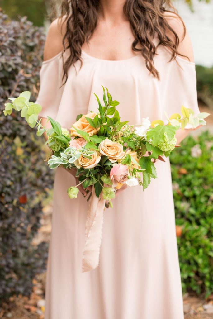 Small wedding in North Carolina with photos by Mikkel Paige Photography. The bridesmaids held fall flower bouquets.