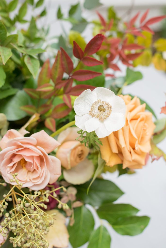 Small wedding in North Carolina with photos by Mikkel Paige Photography. The reception for less than 50 people had jewel tone fall flowers.