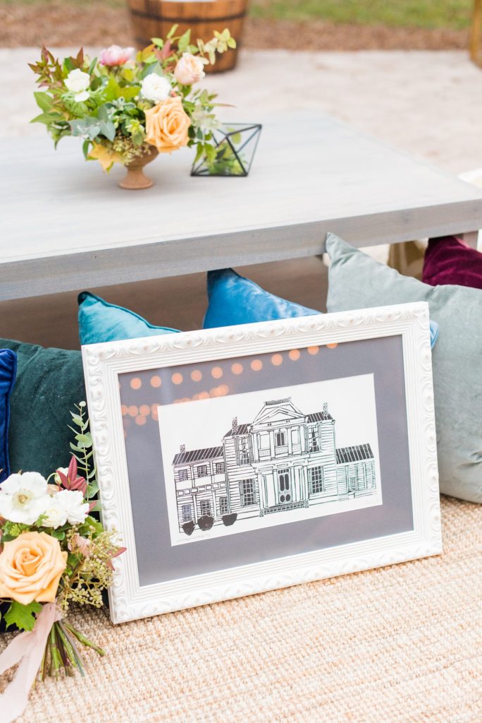 Small wedding in North Carolina with photos by Mikkel Paige Photography. The reception for less than 50 people had many details like a framed linocut print of the venue.