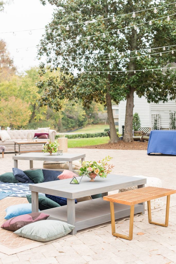 Small wedding in North Carolina with photos by Mikkel Paige Photography. The reception for less than 50 people had mixed seating and jewel tones.