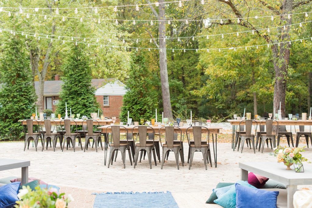 Small wedding in North Carolina with photos by Mikkel Paige Photography. The reception for less than 50 people had mixed seating and jewel tones.