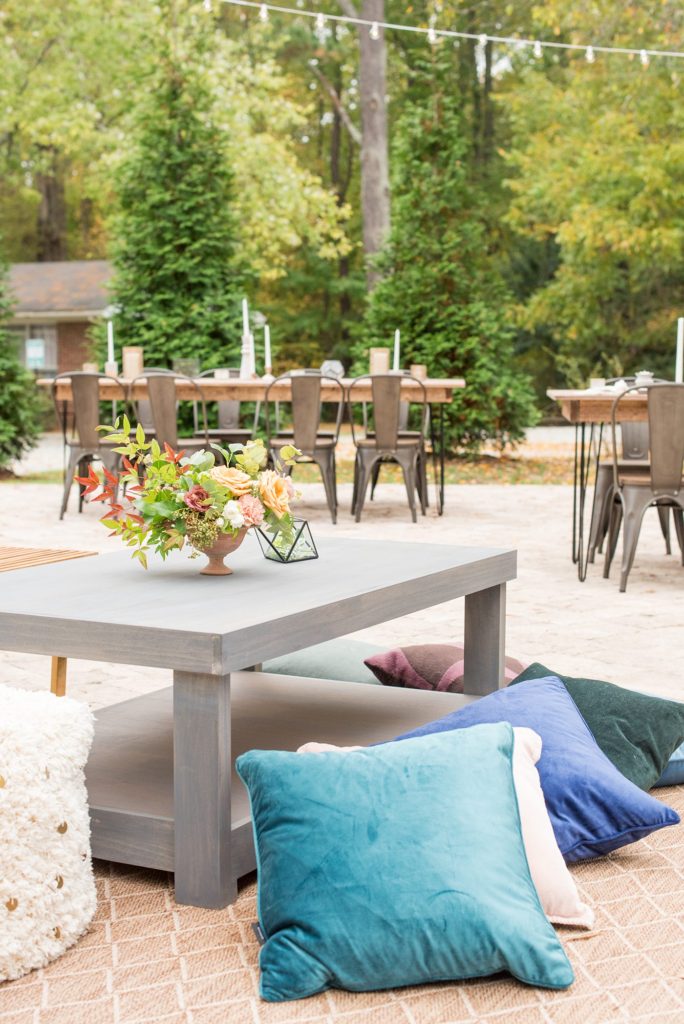 Small wedding in North Carolina with photos by Mikkel Paige Photography. The reception for less than 50 people had mixed seating and jewel tones.