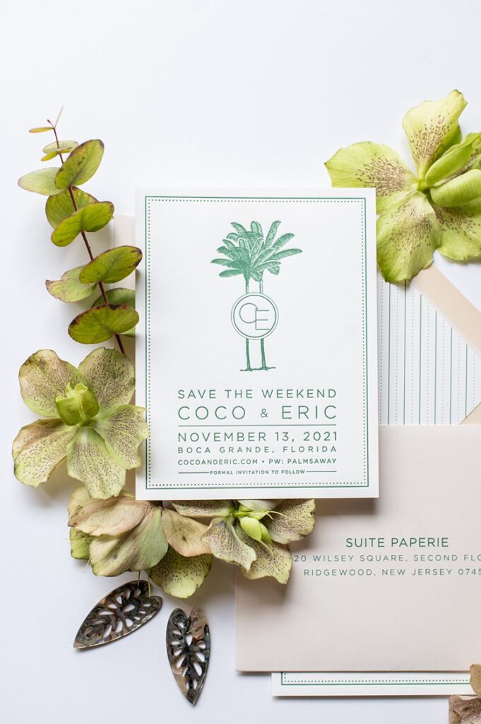 Palm Tree Wedding Save the Dates with green floral styling around the image.