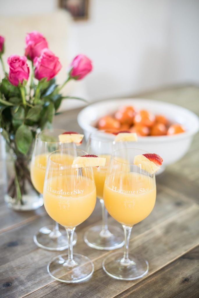 An intimate destination wedding elopement for a vineyard wedding in California at HammerSky Vineyards with Mikkel Paige Photography. The bride, groom and their best friends enjoy a wedding brunch before the big day.