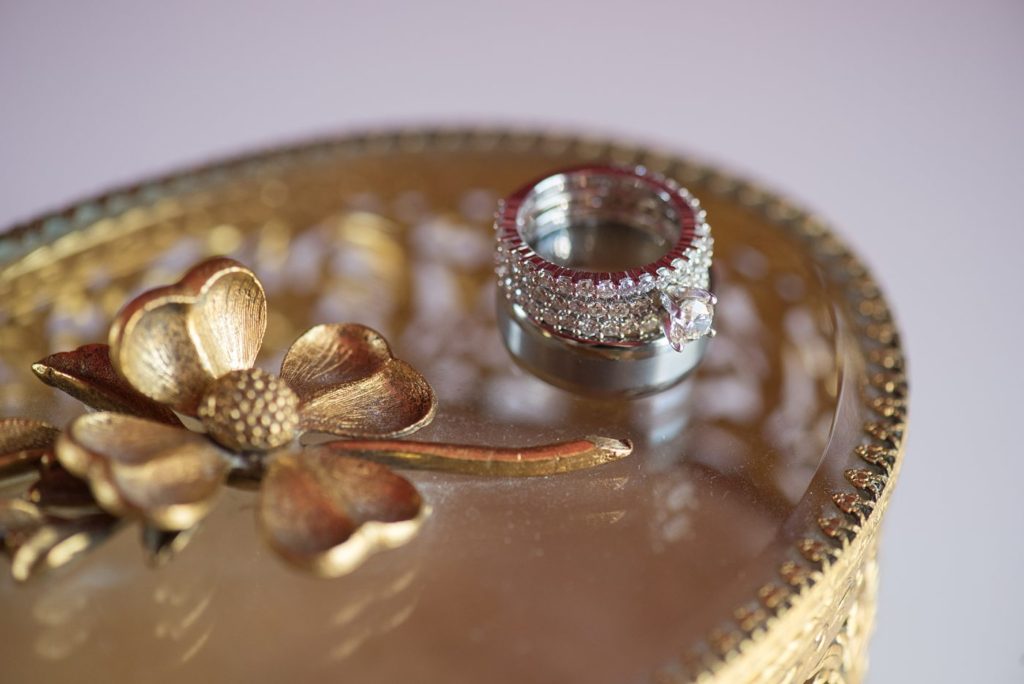 Detail photo of the rings at a small destination wedding elopement for a vineyard wedding in California at HammerSky Vineyards with Mikkel Paige Photography.