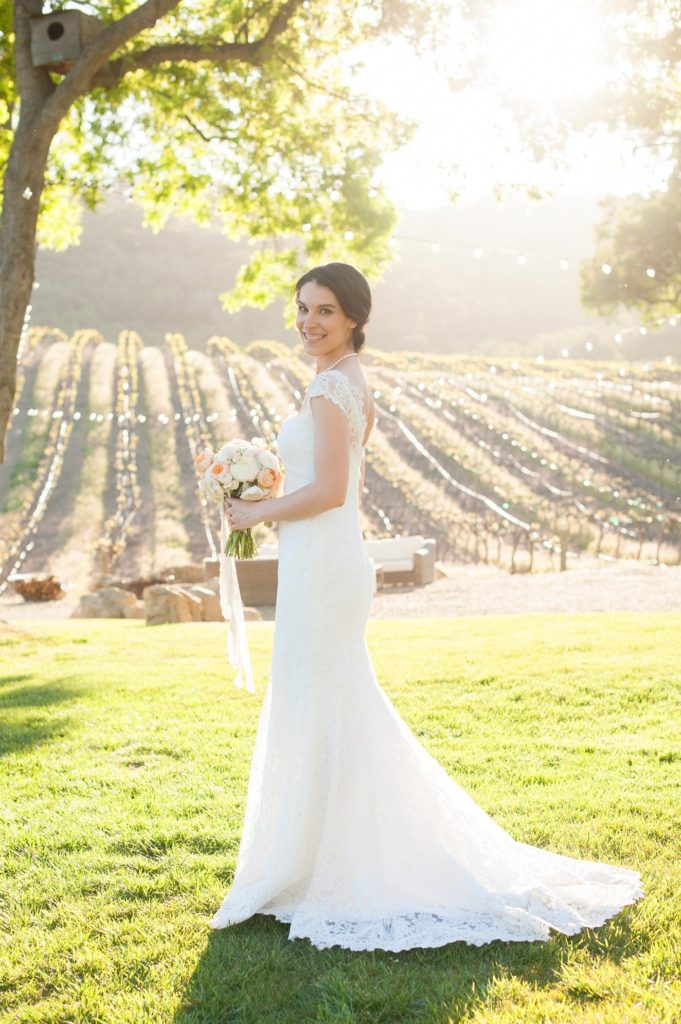 The bride during her small destination wedding at a vineyard venue in California at HammerSky Vineyards with Mikkel Paige Photography.