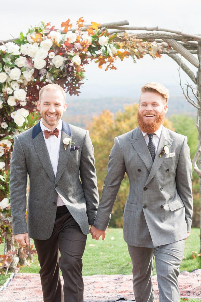Cedar Lakes Estate wedding with two grooms. This beautiful fall wedding had a picturesque ceremony view and beautiful fall flowers. Photographed by Mikkel Paige Photography, planning by Jove Meyer Events and flowers by Mimosa Floral Design.