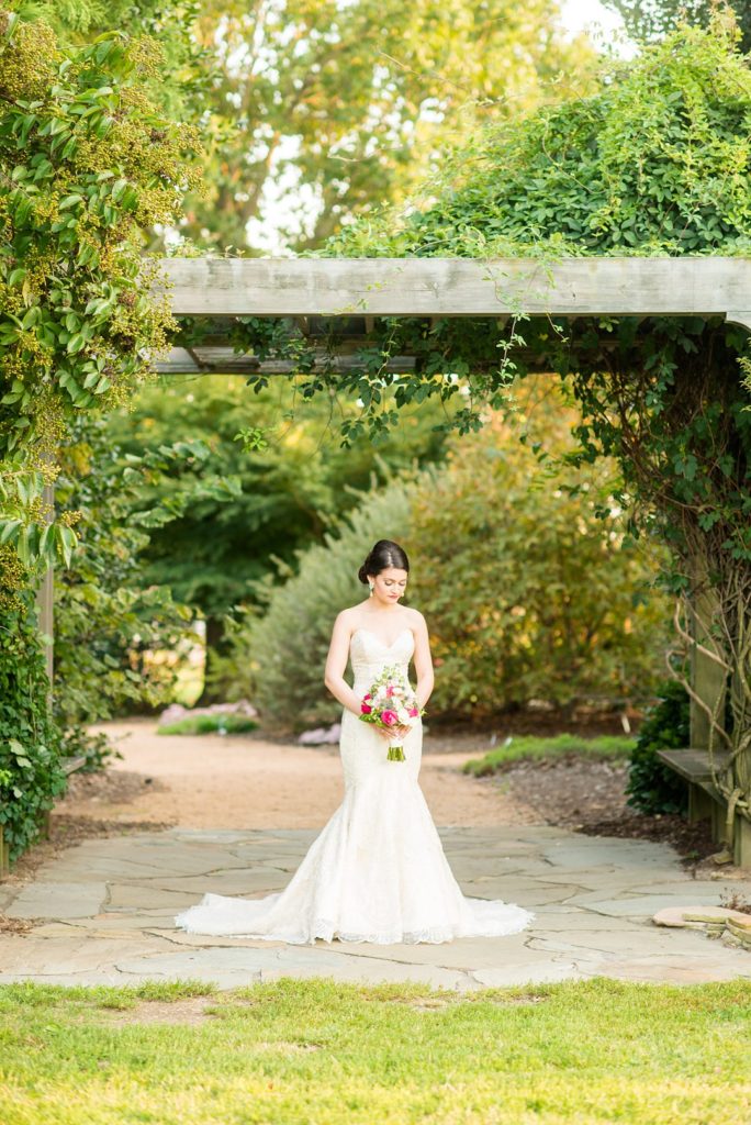 A bridal session captured by Mikkel Paige Photography in a beautiful garden in Raleigh, North Carolina.