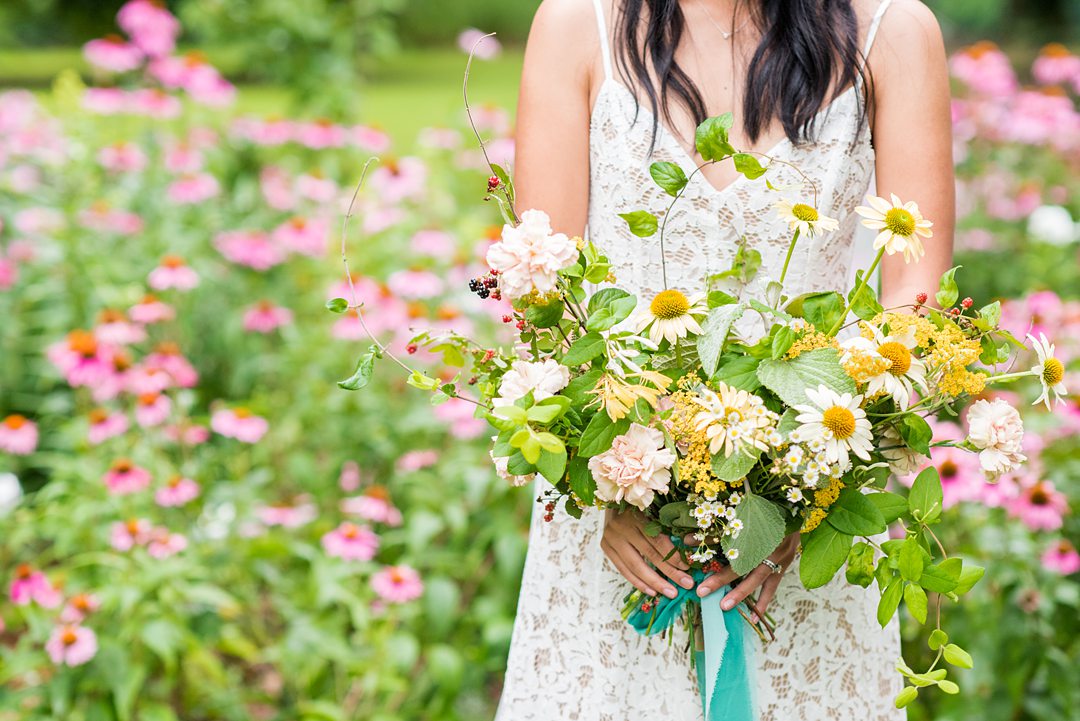 A wildflower bridal bouquet photographed by Mikkel Paige Photography and created by Mood Fleuriste. The couple eloped when COVID-19 changed their original plan.